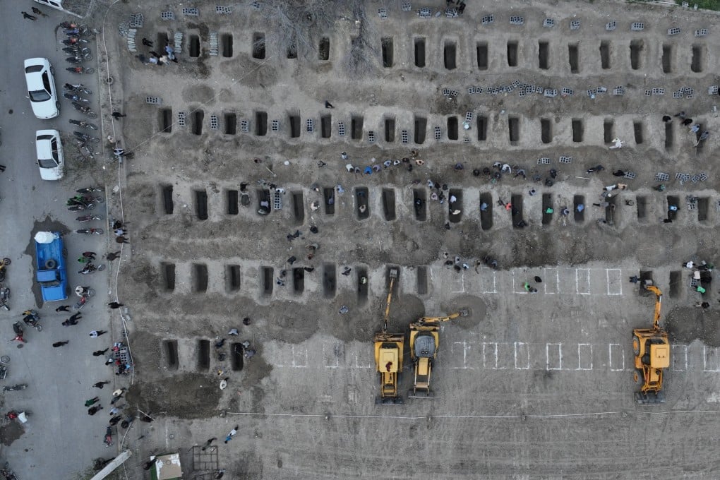Graves for victims of the strike on a school in Minab, Iran. Photo: Iranian Foreign Media Department via Reuters