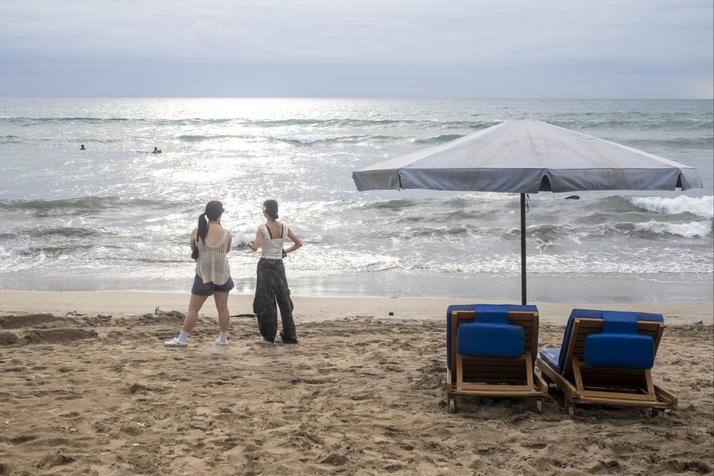 Tourists relax at a beach in Bali, Indonesia. Photo: EPA
