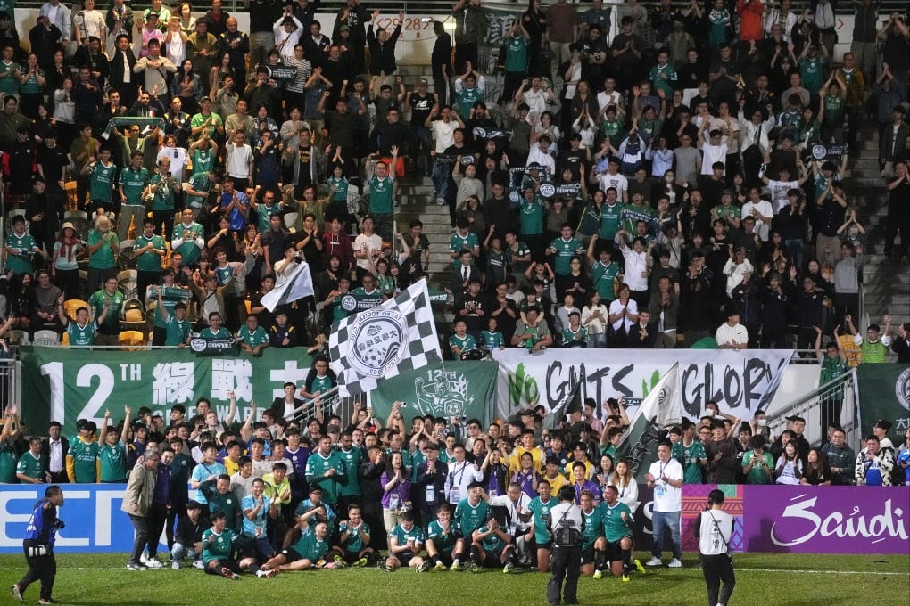 Tai Po players and staff celebrate with fans following their ACL2 victory over Cong An Hanoi last December. Photo: Elson Li