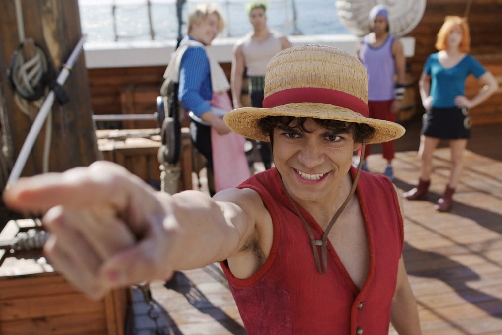 (Front) Iñaki Godoy and (back, from left) Taz Skylar, Mackenyu Arata, Jacob Romero and Emily Rudd in a still from One Piece season two. Photo: Netflix