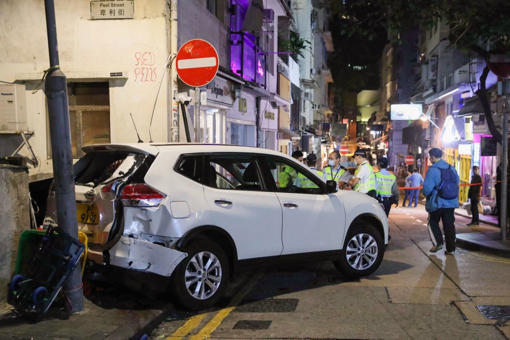 The unsecured car rolled down a slope on Peel Street and crossed Staunton Street, killing one person and injuring seven others. Photo: Edmond So