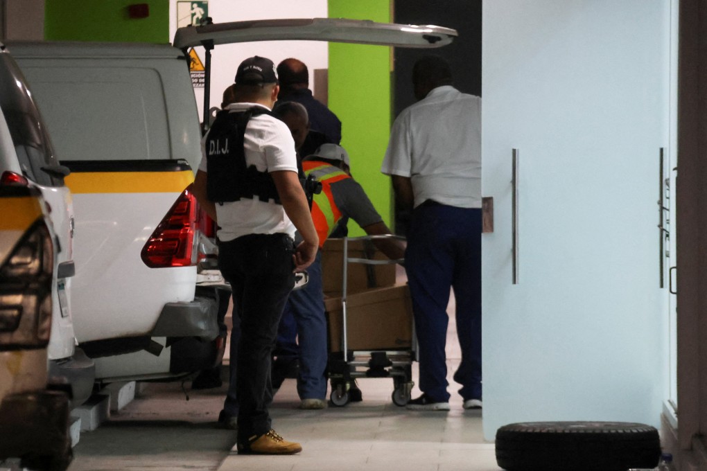 Panamanian police search a Panama Ports Company office. Photo Reuters