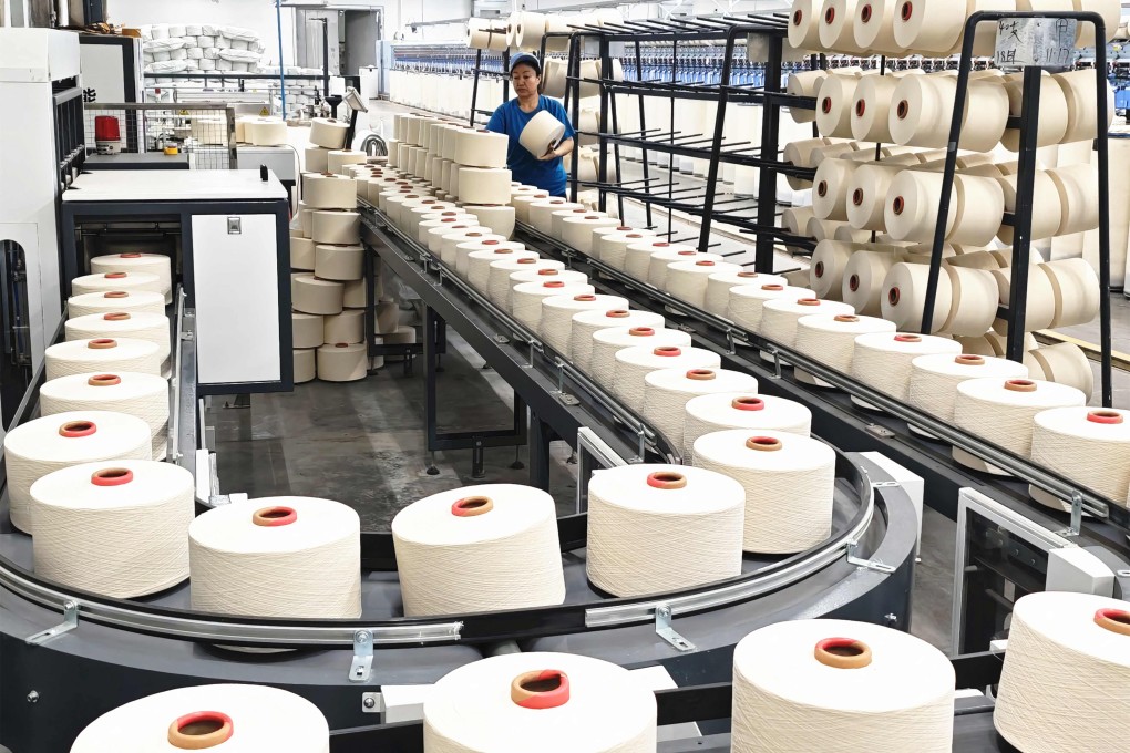 A senior official in Xinjiang Uygur autonomous region says he will fight external pressure on the textile industry, including from US sanctions, and boost legal support for affected companies. Photo: AFP