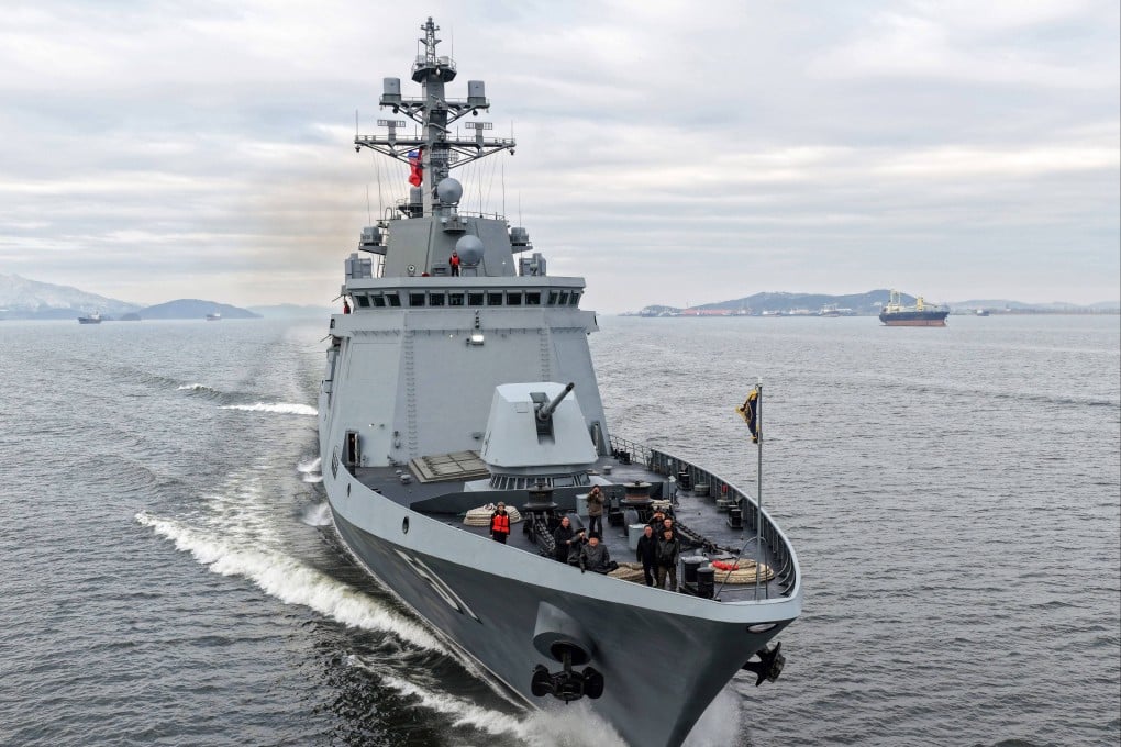 North Korean leader Kim Jong-un is seen aboard the country’s first 5,000-tonne multipurpose destroyer, the Choe Hyon, in waters near the western coastal city of Nampo on Wednesday. Photo: KCNA/KNS/dpa