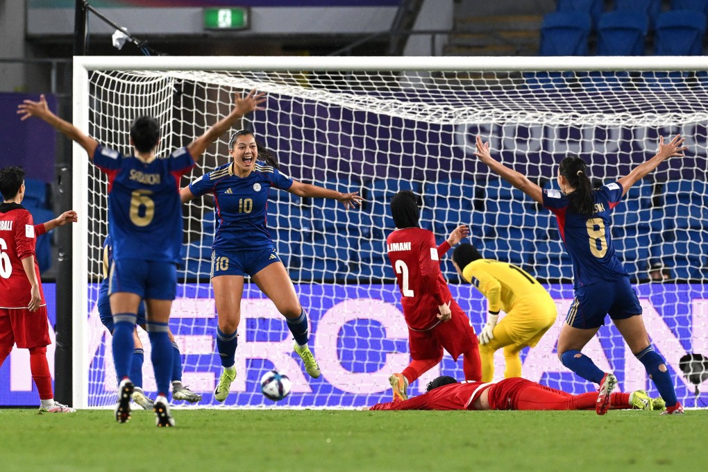 Philippines’ Chandler McDaniel (centre) scores her team’s second goal in their Women’s Asian Cup match against Iran at Gold Coast Stadium on Sunday. Photo: dpa