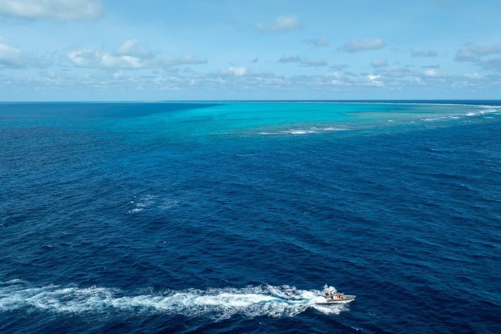 Chinese coastguard personnel patrol the waters around the disputed Scarborough Shoal, which Beijing claims as Huangyan Island, in November 2025. Photo: Xinhua