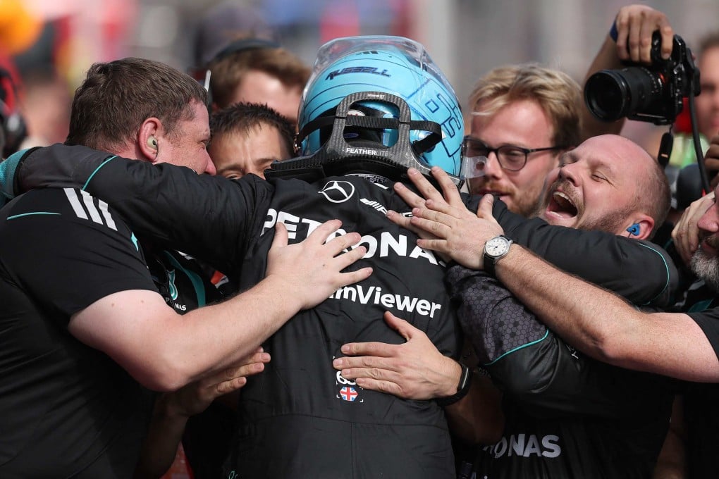 Mercedes’ George Russell celebrates with teammates after winning the Australian Grand Prix. Photo: AFP
