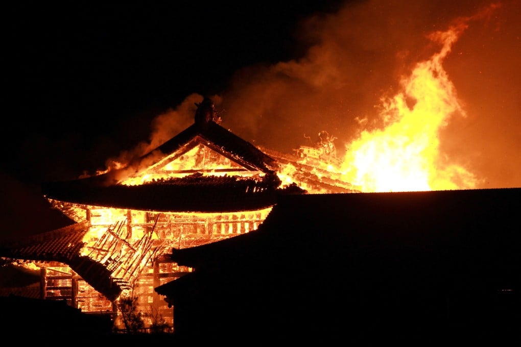 Flames engulf Shuri Castle in Naha, Okinawa prefecture, in October 2019. The fire destroyed several major structures at the Unesco World Heritage site. Photo: EPA-EFE