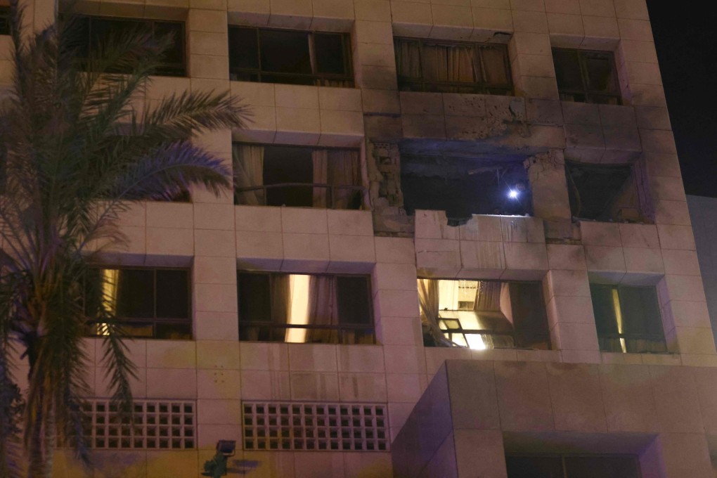 First aid responders inspect a Ramada hotel room targeted by an Israeli strike, in Beirut, Lebanon, on Sunday. Photo: AFP