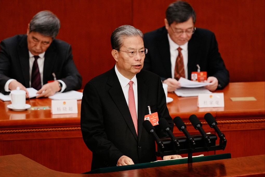 Zhao Leji, chairman of the National People’s Congress Standing Committee, speaks at the Great Hall of the People in Beijing on Monday. Photo: AP