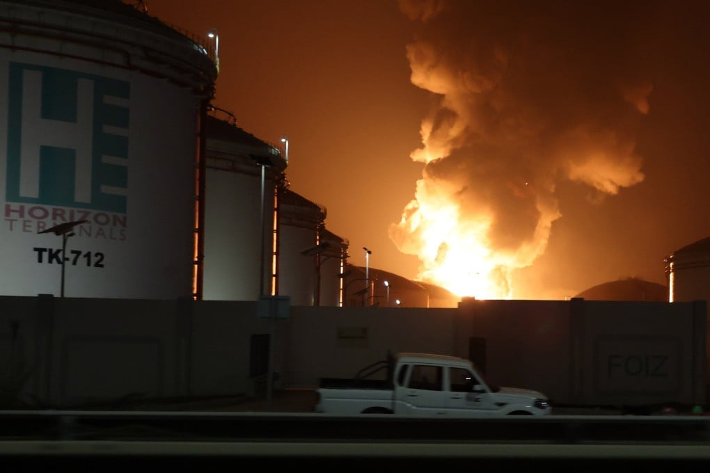 Flames rise during a fire caused by debris from an intercepted drone at the oil refinery hub in Fujairah, United Arab Emirates, on March 4. Photo: EPA