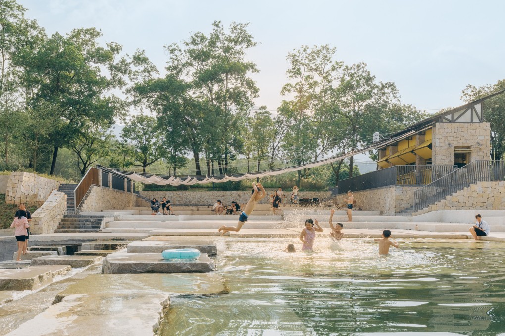 Children play in the river as adults relax on the shore at The Grand Canopy in Xialang Village, in China’s Huizhou region. Designed by Chinese architect Zhao Rongzhi and artist Zhu Xiongyi, The Grand Canopy is one of many Instagram hotspots around Huizhou’s 218 Highway. Photo: Zhu Yumeng