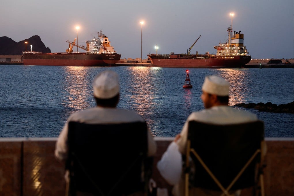 Ships sit anchored in Muscat, Oman, on Monday, as Iran vows to close the Strait of Hormuz. Photo: Reuters