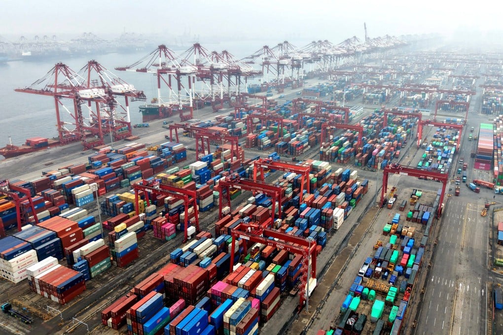 Cargo containers and ships at a port in Qingdao, Shandong province, on March 3. Photo: AFP