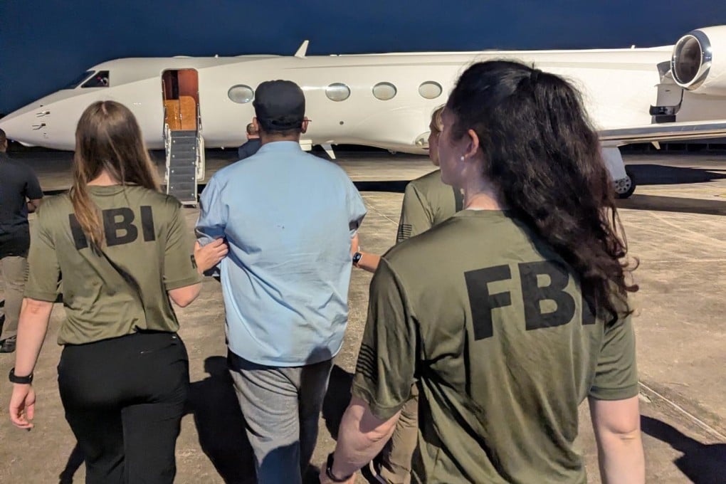 Bangladeshi national Zobaidul Amin is escorted to an aircraft by FBI agents. Photo: X / FBI Director Kash Patel