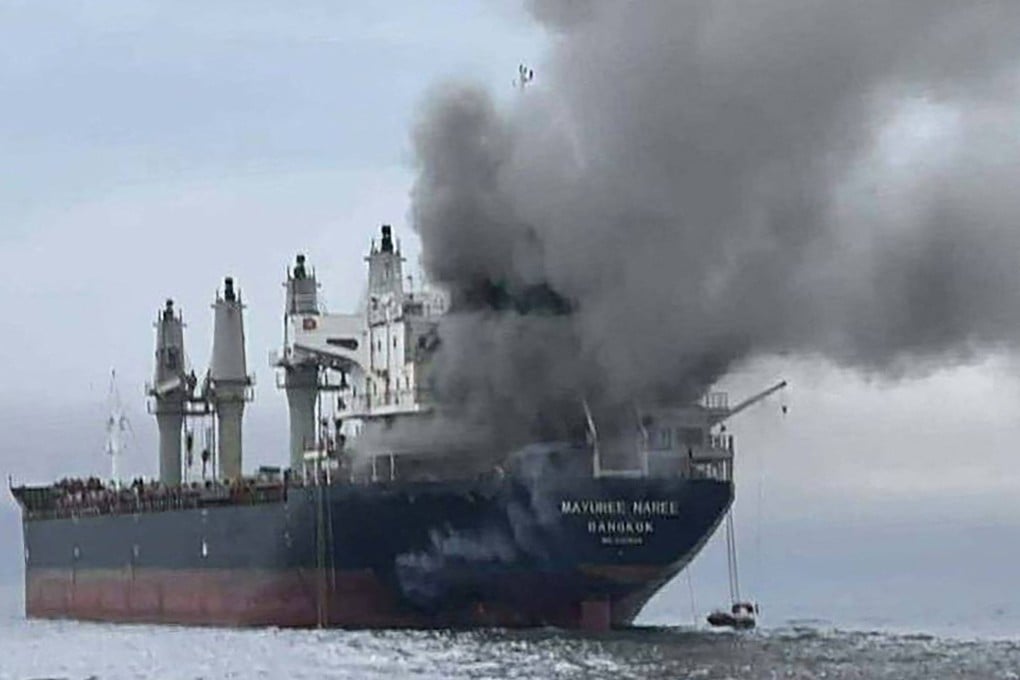 This handout photo taken on Wednesday and released by the Royal Thai Navy shows smoke rising from the Thai bulk carrier Mayuree Naree near the Strait of Hormuz after an attack. Photo: AFP/Royal Thai Navy