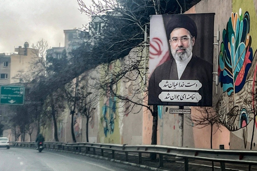 A banner depicting Iran’s new Supreme Leader Mojtaba Khamenei on the side of a highway in Tehran. Photo: AFP