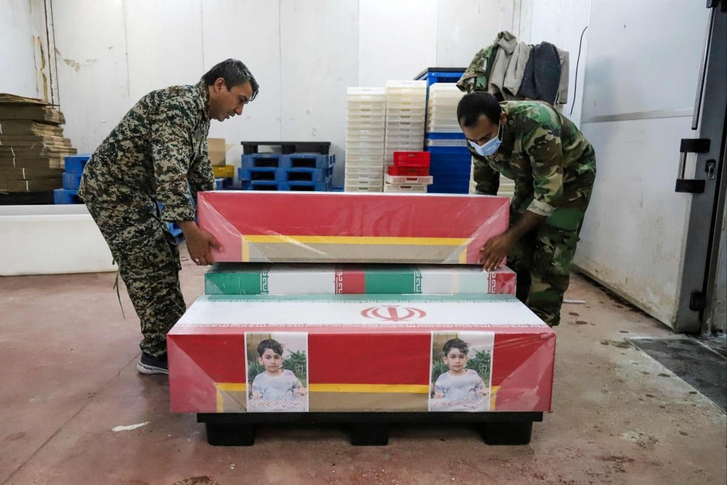 Coffins of children who were killed in a strike on a primary school in Iran. Photo: AFP