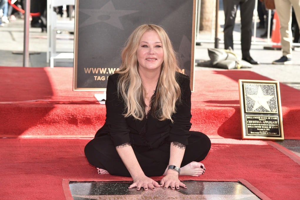 Christina Applegate poses at a ceremony honouring her with a star on the Hollywood Walk of Fame in Los Angeles on November 14, 2022. The American actress released her memoir, You with the Sad Eyes, in March. Photo: AP