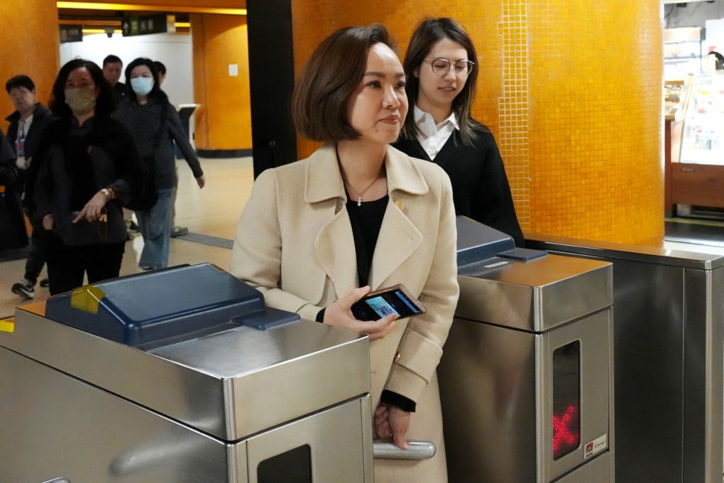 Judy Chan passes through a gate at an MTR station, opting for public transport as she leaves Eastern Court after receiving a fine on March 9. Photo: Jelly Tse