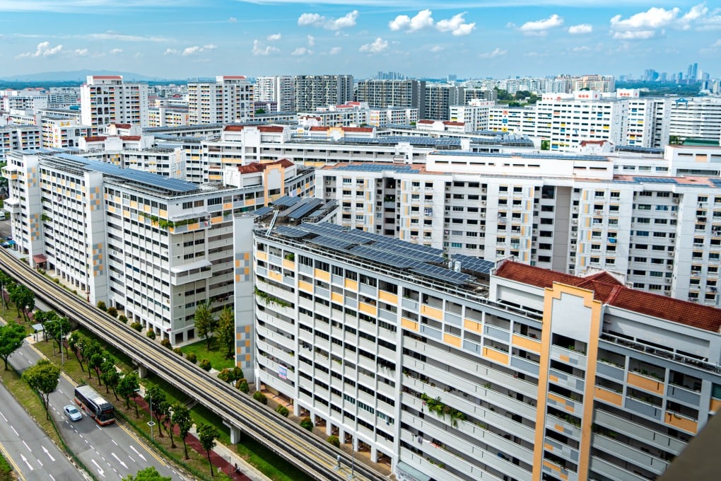 Housing Development Block flats in Singapore. A man and his lover were caught by her husband while naked in a car at a multi-storey car park.  Photo: Getty Images