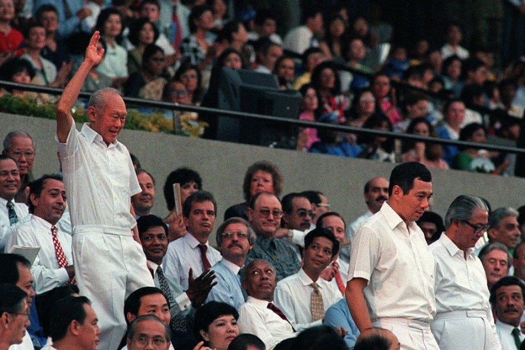 Statesman Lee Kuan Yew waves to the crowd at the National Day celebration in Singapore on August 9, 1996. Photo: AFP