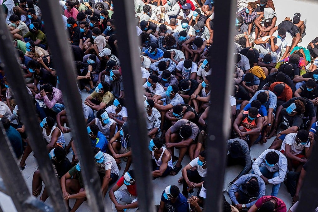 Detained scam centre workers are seen after a raid on a compound in Myanmar’s eastern Myawaddy township last year. Photo: AFP