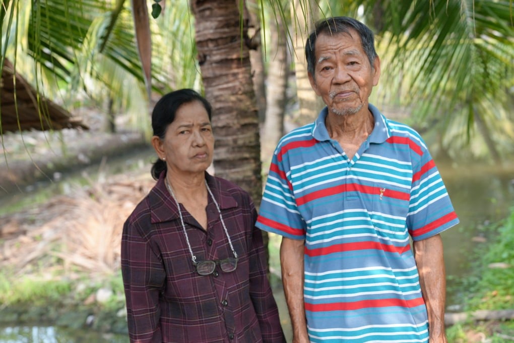Thai coconut farmers Supon Haochareon (right) and Lamduan Haochareon. Photo: Aidan Jones