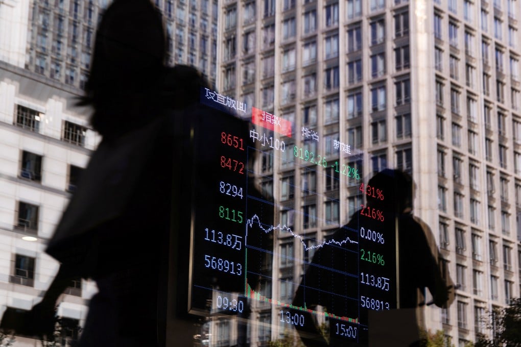 Stock information is displayed in the window of a brokerage house in Beijing on October 13, 2025. Photo: Reuters