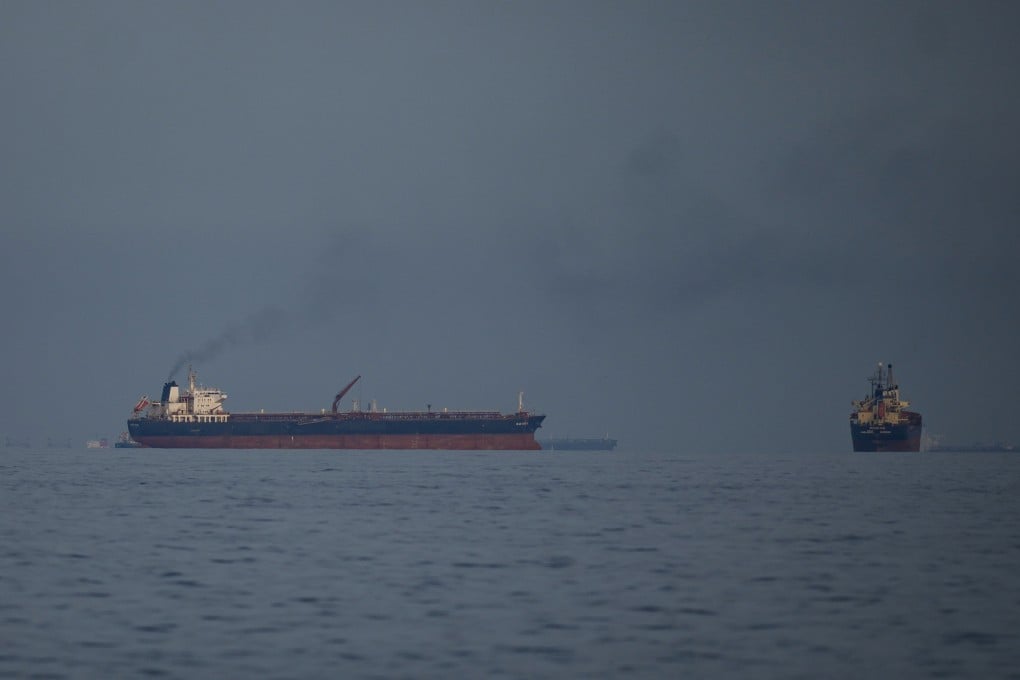 Oil tankers and cargo ships line up in the Strait of Hormuz as seen from Khor Fakkan, United Arab Emirates, on Wednesday. Photo: AP