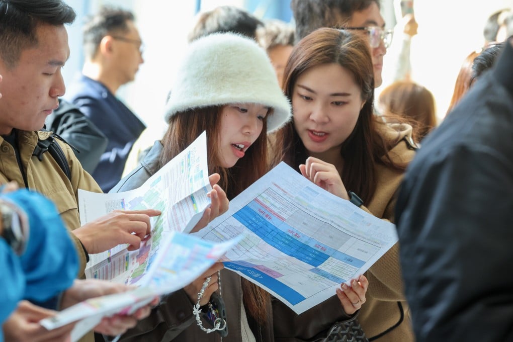 Prospective buyers for the Cloudview project on Saturday. Wing Tai sold 149 of the 200 units released in the first round of sales for its Sheung Shui development. Photo: Dickson Lee