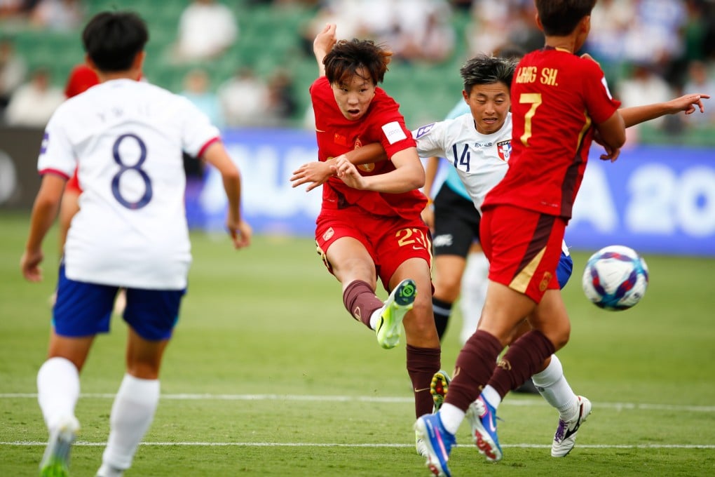 China’s Shao Ziqin (centre) scores her team’s first goal during the Women’s Asian Cup quarter-final against Chinese Taipei in Perth on Saturday. Photo: AP