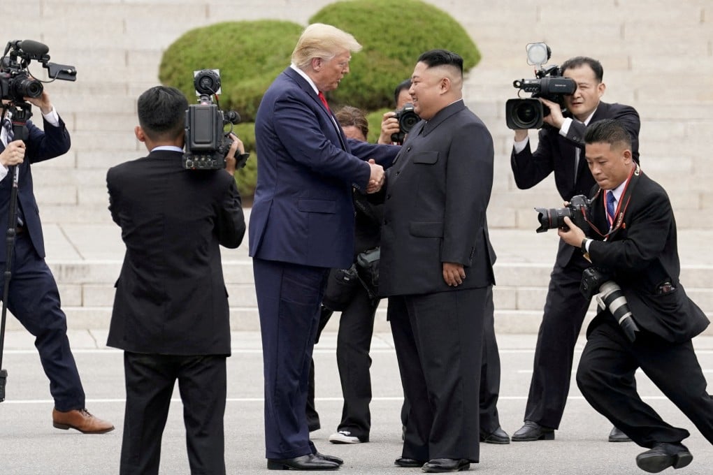 President Donald Trump meets North Korean leader Kim Jong-un at the demilitarised zone separating the two Koreas on June 30, 2019. Photo: Reuters