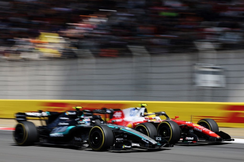 Mercedes’ George Russell (left) and Ferrari’s Lewis Hamilton exchanged the lead several times in the opening laps of the Chinese Grand prix sprint race on Saturday. Photo: Reuters