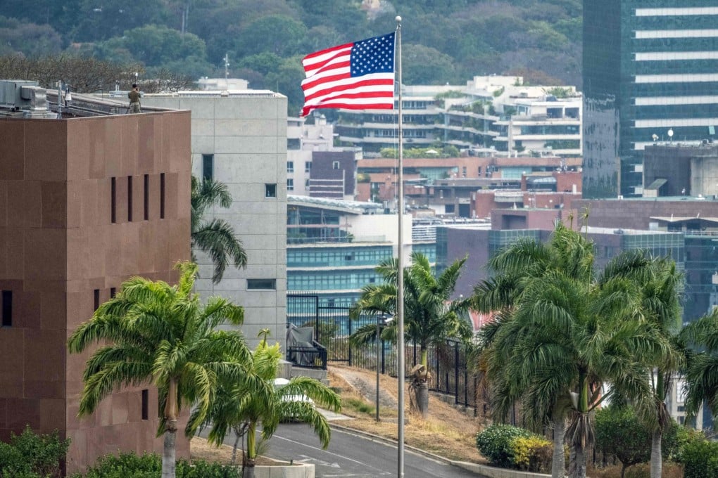The US flag flutters at the US embassy in Caracas on Saturday. Photo: AFP