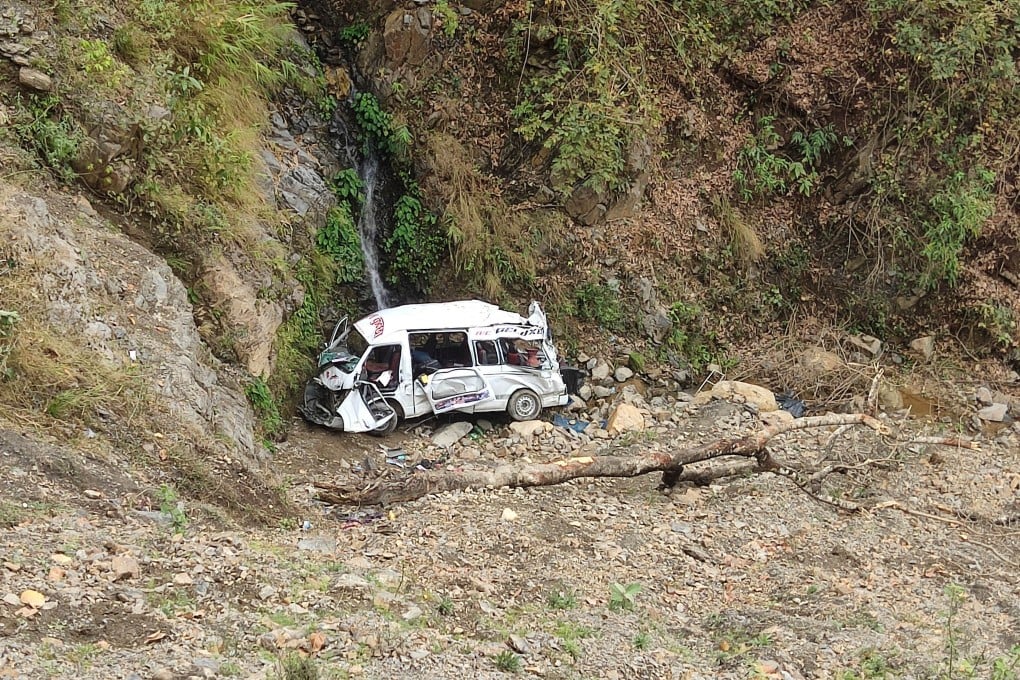The wreckage of a bus that rolled down a mountain slope, killing seven, sits at Shahid Lakhan village, west of Nepal’s capital Kathmandu, on Sunday. Photo: AP