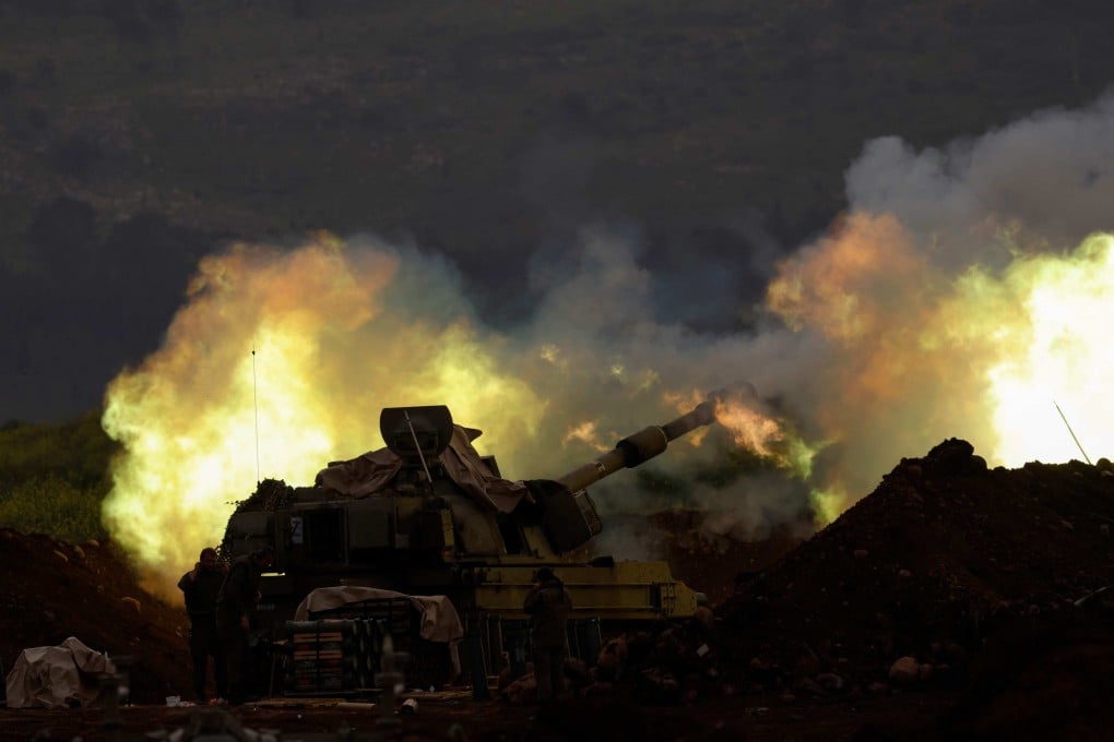 An Israeli artillery unit fires towards southern Lebanon on Saturday. Photo: AFP