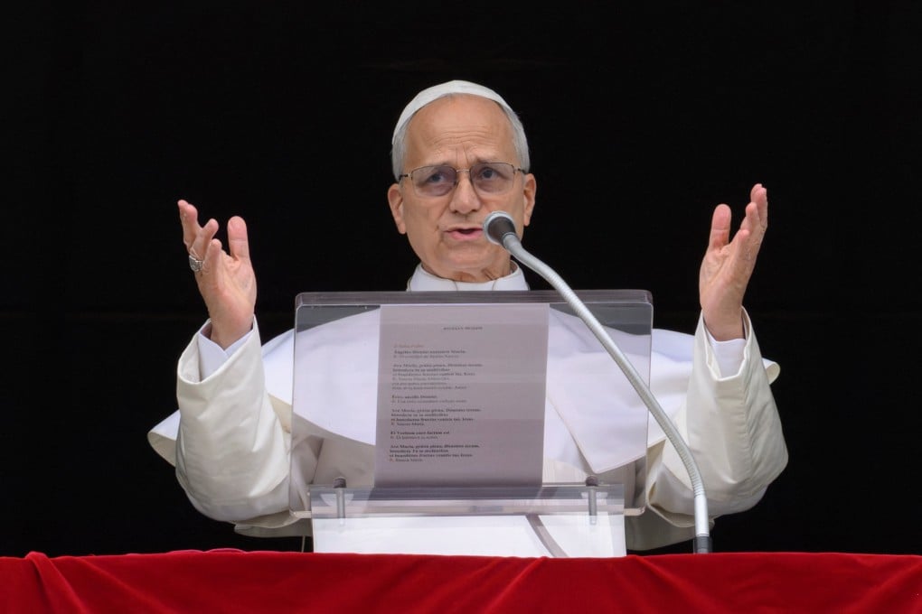 Pope Leo leads prayers from a window at the Vatican on Sunday. Photo: Handout via Reuters