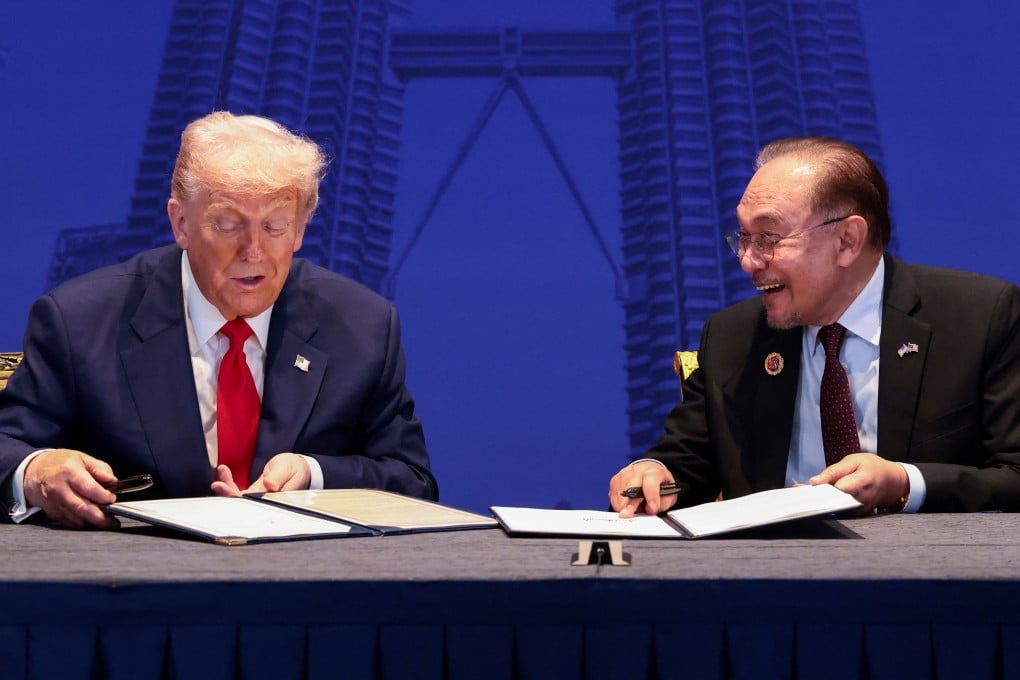 US President Donald Trump and Malaysian Prime Minister Anwar Ibrahim sign a trade deal in Kuala Lumpur in October. Photo: Reuters