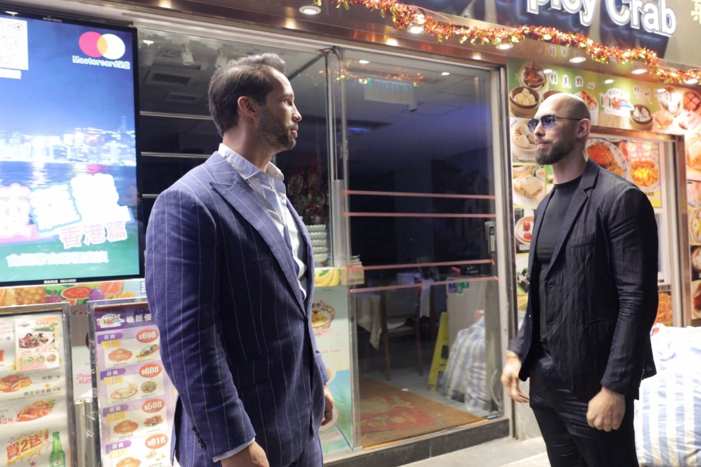 Andrew Tate (right) with his brother Tristan outside a restaurant in Hong Kong. Photo: X/Andrew Tate