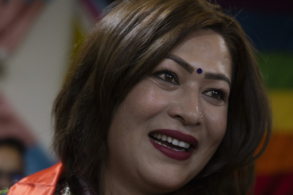 Bhumika Shrestha, Nepal’s first transgender woman to become a member of parliament, is congratulated by members of the LGBTQ community in Kathmandu on Monday. Photo: EPA