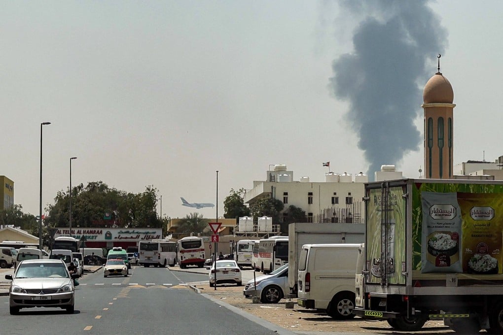 Smoke rises from an ongoing near Dubai International Airport. Photo: AFP