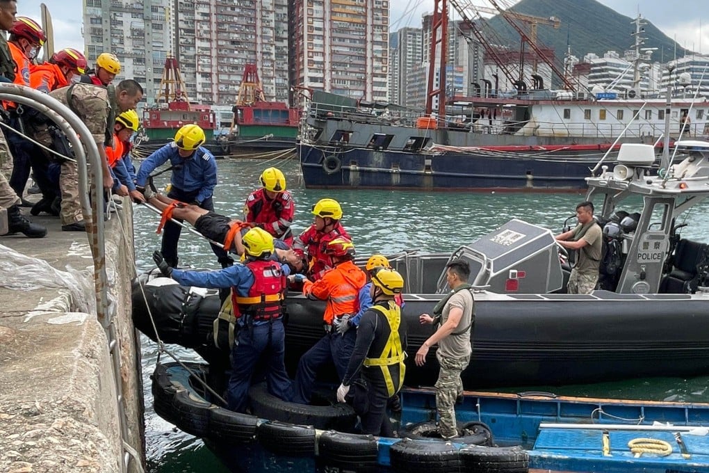 The man, who jumped into the water after his wife and child were swept into the sea, is stretchered off a rescue boat in September last year. Photo: Handout