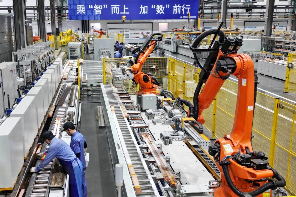 Workers on the assembly line at a coil factory in Harbin, northeast Heilongjiang province, on August 4, 2025. Photo: Xinhua