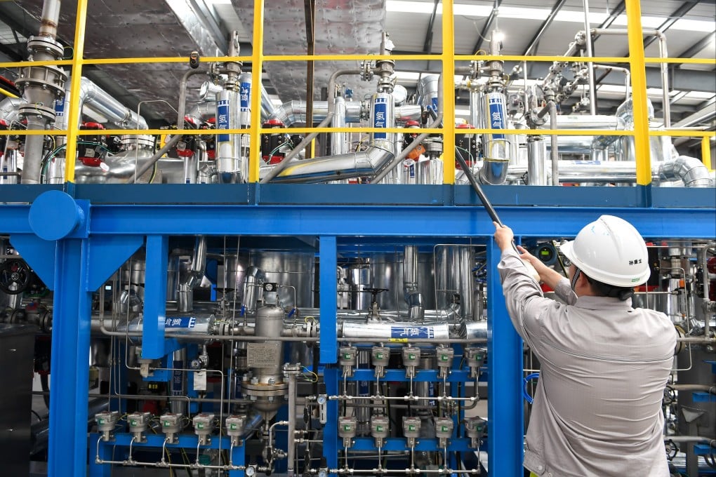 A worker checks hydrogen production equipment at an energy company in Changchun, northeast China’s Jilin province, on August 12, 2024. Photo: Xinhua
