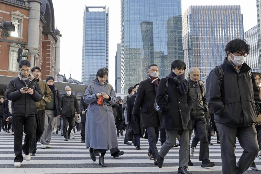 People walk near Tokyo Station in January. Government data showed a record 4.13 million foreign nationals living in Japan at the end of 2025. Photo: Kyodo