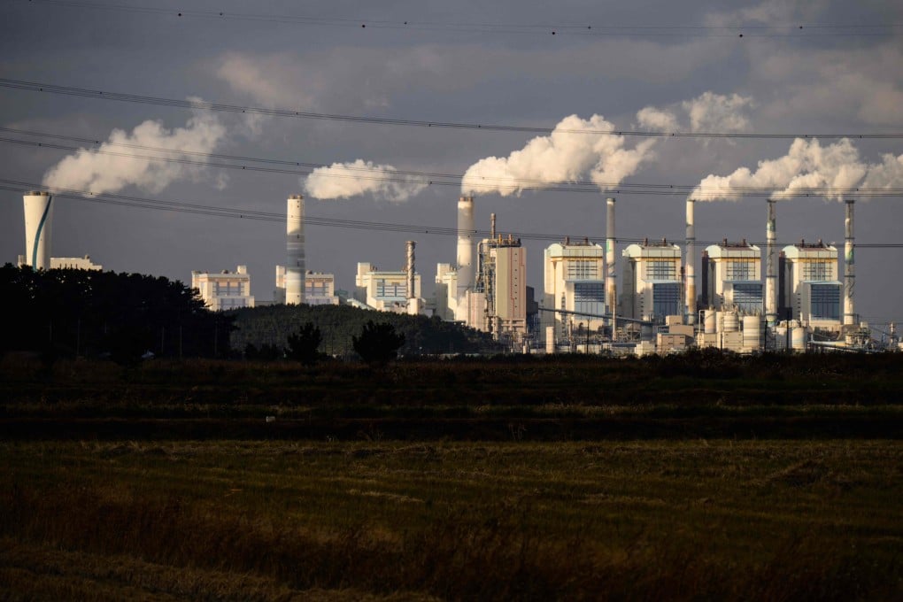 Exhaust gases billow from the chimneys of the Taean Thermal Power Station in South Korea. Photo: AFP