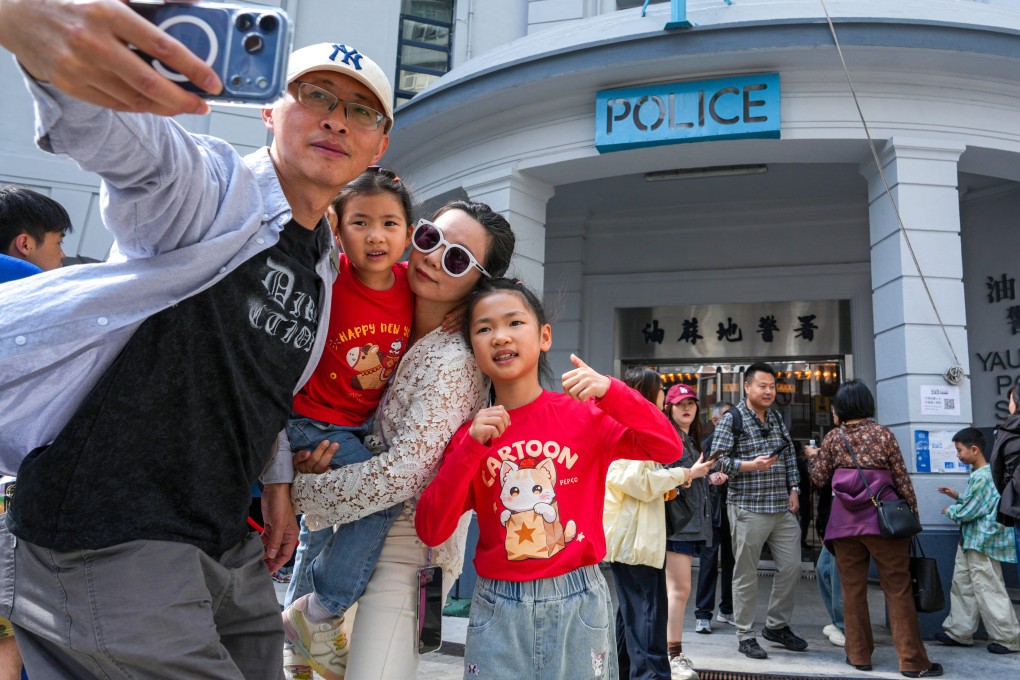 Mainland Chinese tourists visit the former Yau Ma Tei police station. Photo: Sam Tsang
