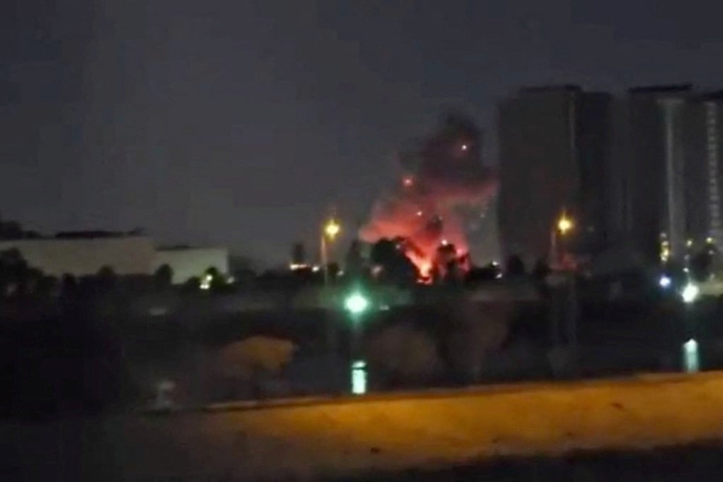 Smoke and fire rise during reported drone and rocket strikes at the US embassy in Baghdad, Iraq. Photo: Reuters