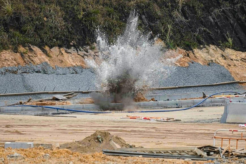 The suspected wartime mortar round was safely detonated by bomb disposal officers at the construction site in Kwu Tung. Photo: Handout